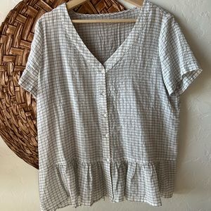 Black and white peplum blouse